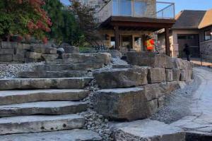 Stone steps with an Armour Stone retaining wall.
